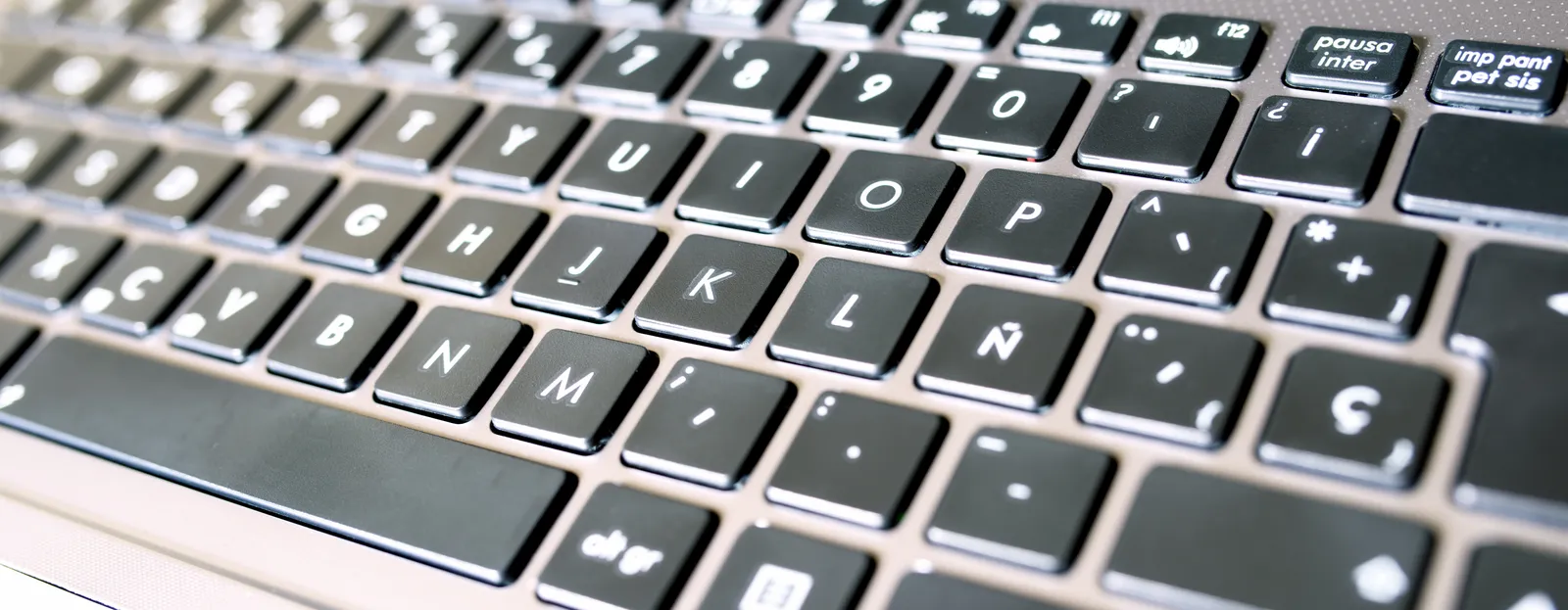 Close-up of hands typing on a laptop keyboard, used as a placeholder image for an article about search ranking problems